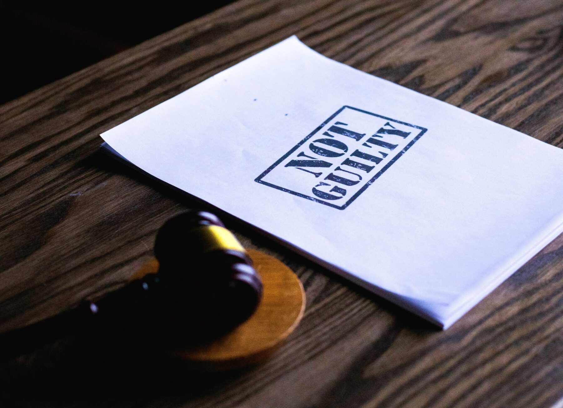 Not guilty text with gavel